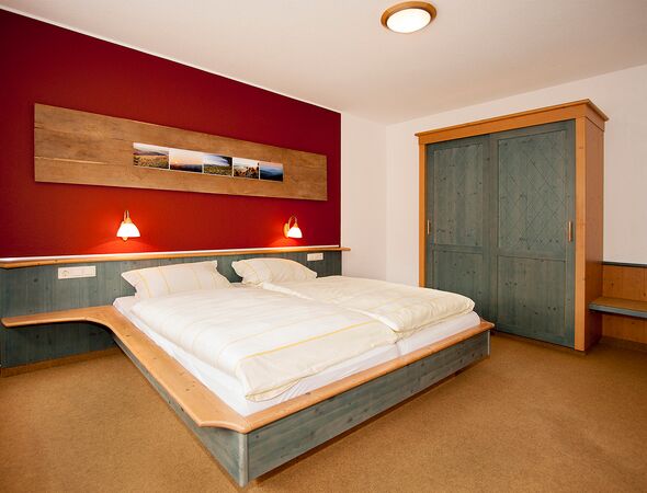 Ferienwohnung 13 Schlafzimmer mit Doppelbett