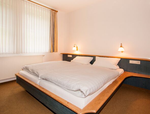 Ferienwohnung 16 Schlafzimmer mit Doppelbett