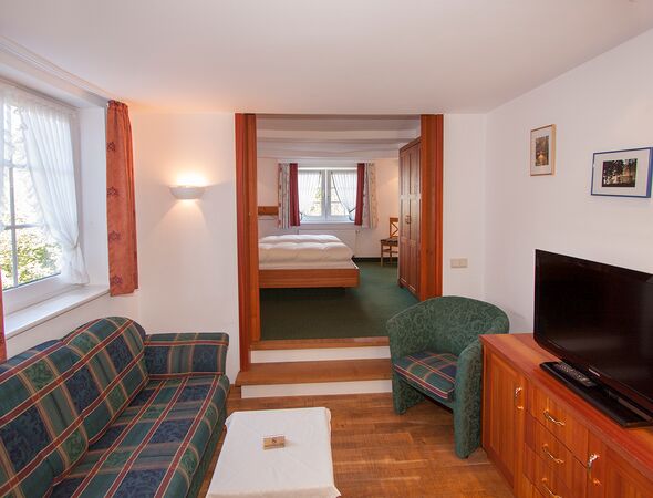 Appartement 32 Woonkamer met bank en tv