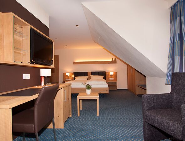 Gut Vorwald Doppelzimmer Wohnbereich mit Bett
